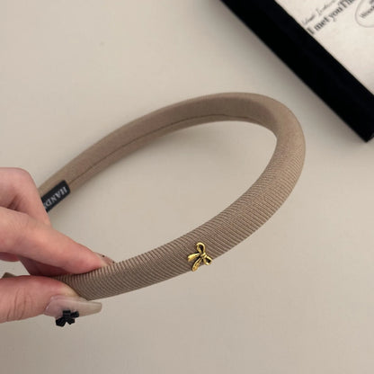 A simple and retro bow headband, a high-end and versatile hair accessory for the top of the head